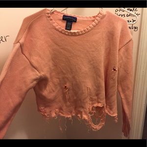 Distressed cropped pink sweater